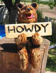 Sitting Bear with Sign